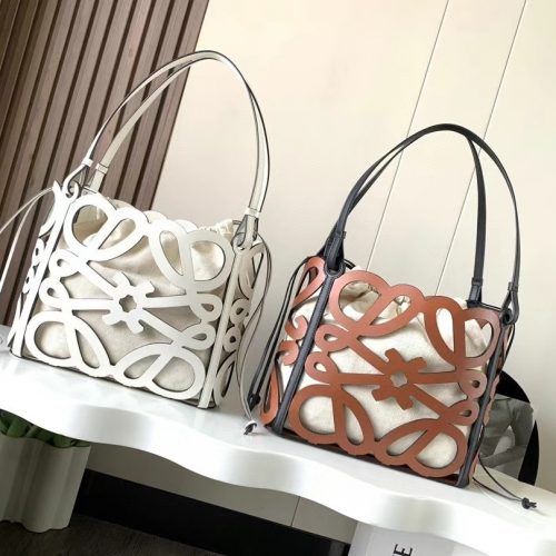 Small cowhide hollowed out Anagram Tote handbag